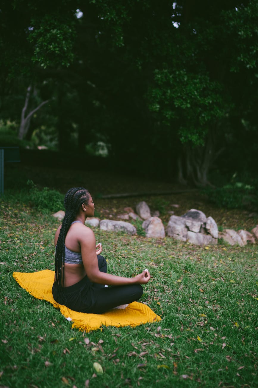 photo of woman doing meditation